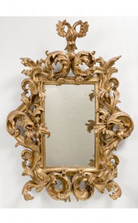 Elegant Estense mirror in foil, Modena 17th century
    